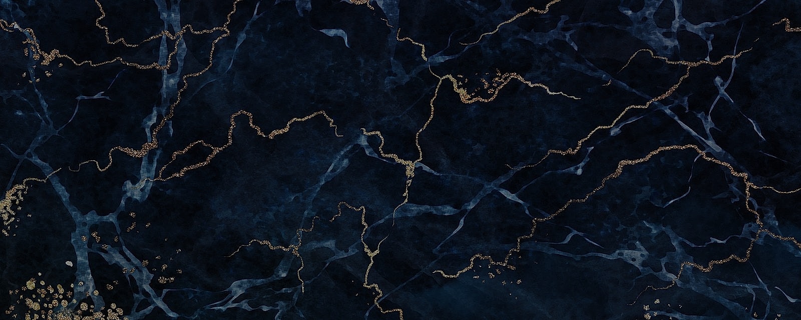 Woman in pink shirt and denim shorts posing.